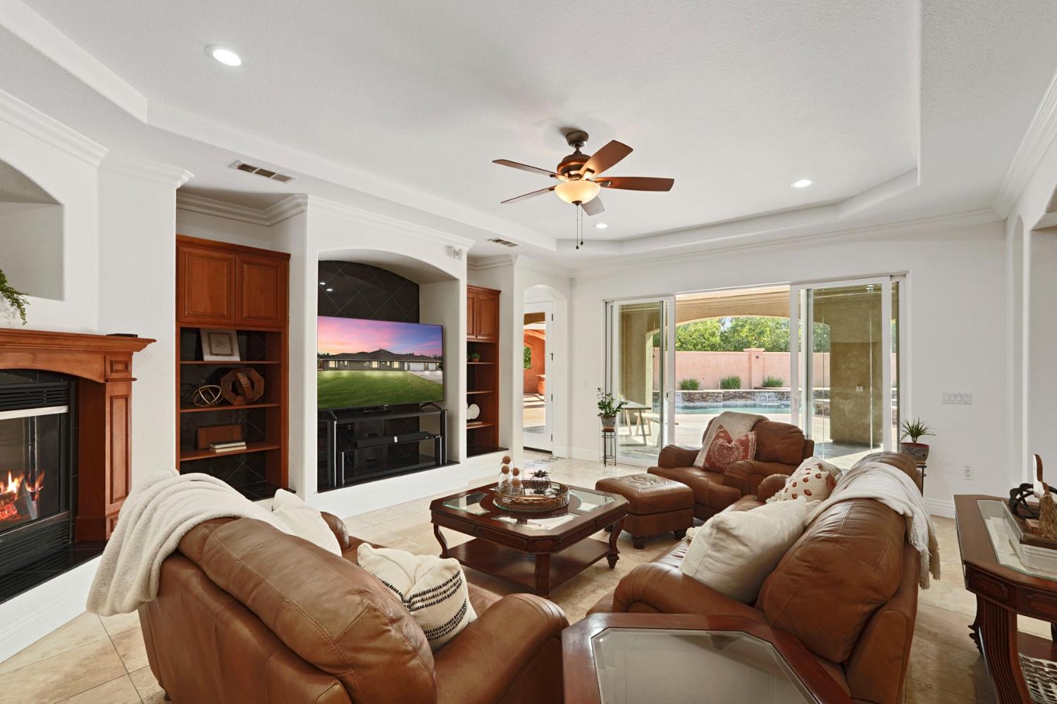 7306 Van Allen Road Stockton, CA 95215 - Photo 23 of 87 a living room with furniture fireplace and flat screen tv