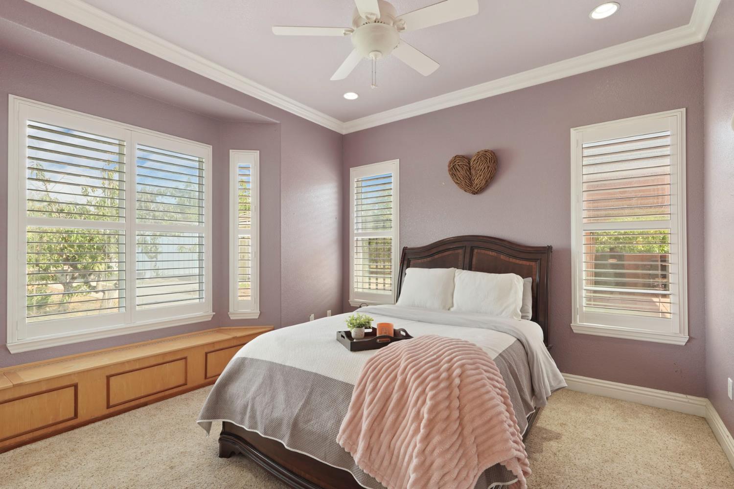 7306 Van Allen Road Stockton, CA 95215 - Photo 51 of 87 a bed sitting in a bedroom next to a window