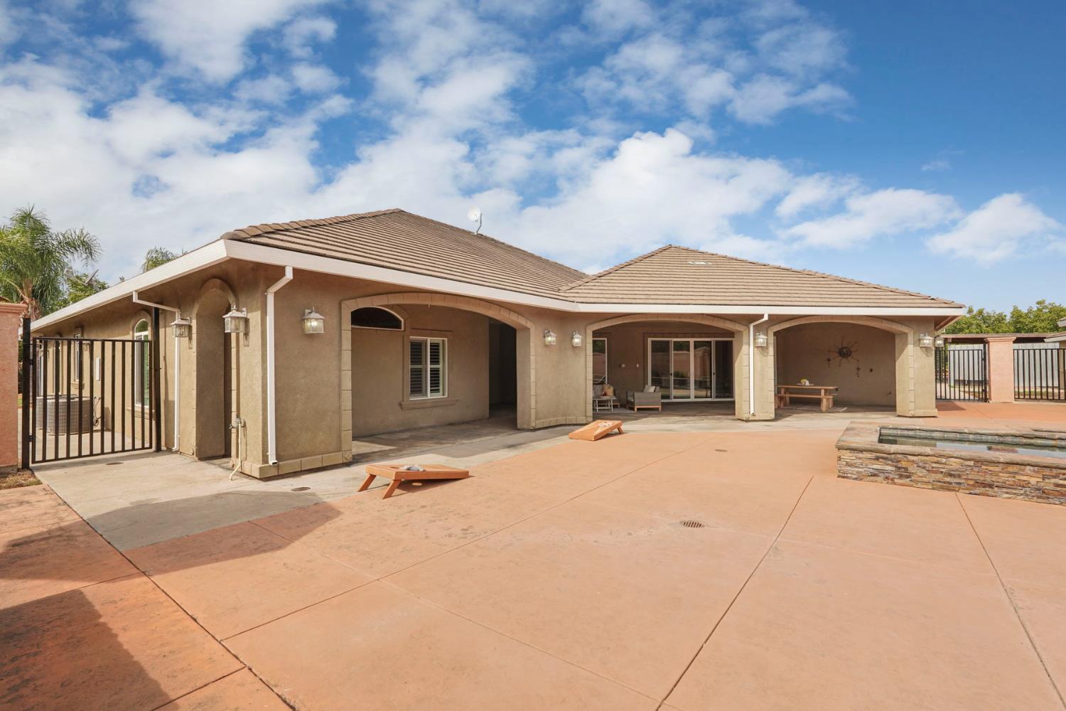 7306 Van Allen Road Stockton, CA 95215 - Photo 59 of 87 a front view of a house with a garden