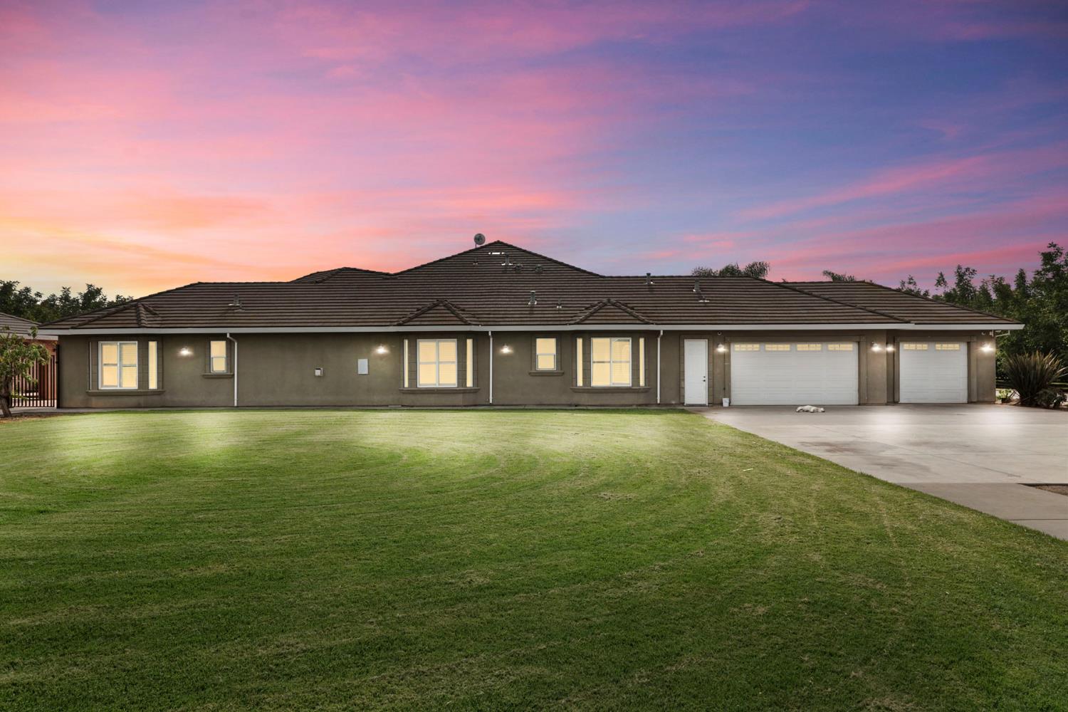 7306 Van Allen Road Stockton, CA 95215 - Photo 69 of 87 a view of a house with a big yard next to a lake