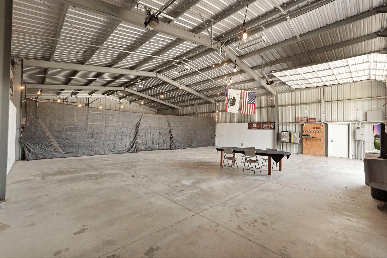 7306 Van Allen Road Stockton, CA 95215 - Photo 80 of 87 a view of a garage with wooden furniture