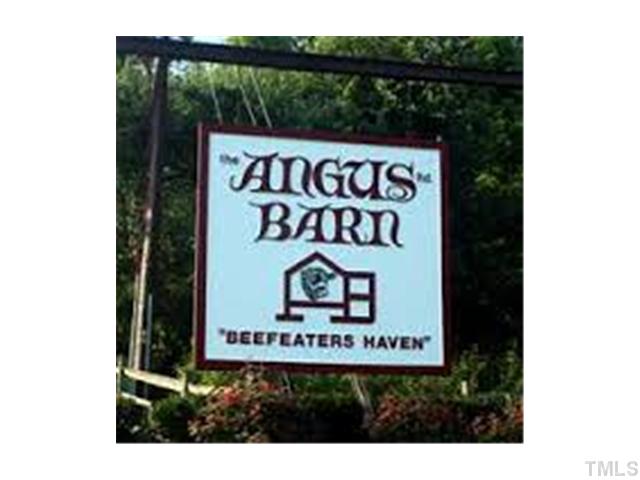 7813 Silverthread Lane Raleigh, NC 27617 - Photo 22 of 25 a sign broad in front of a house