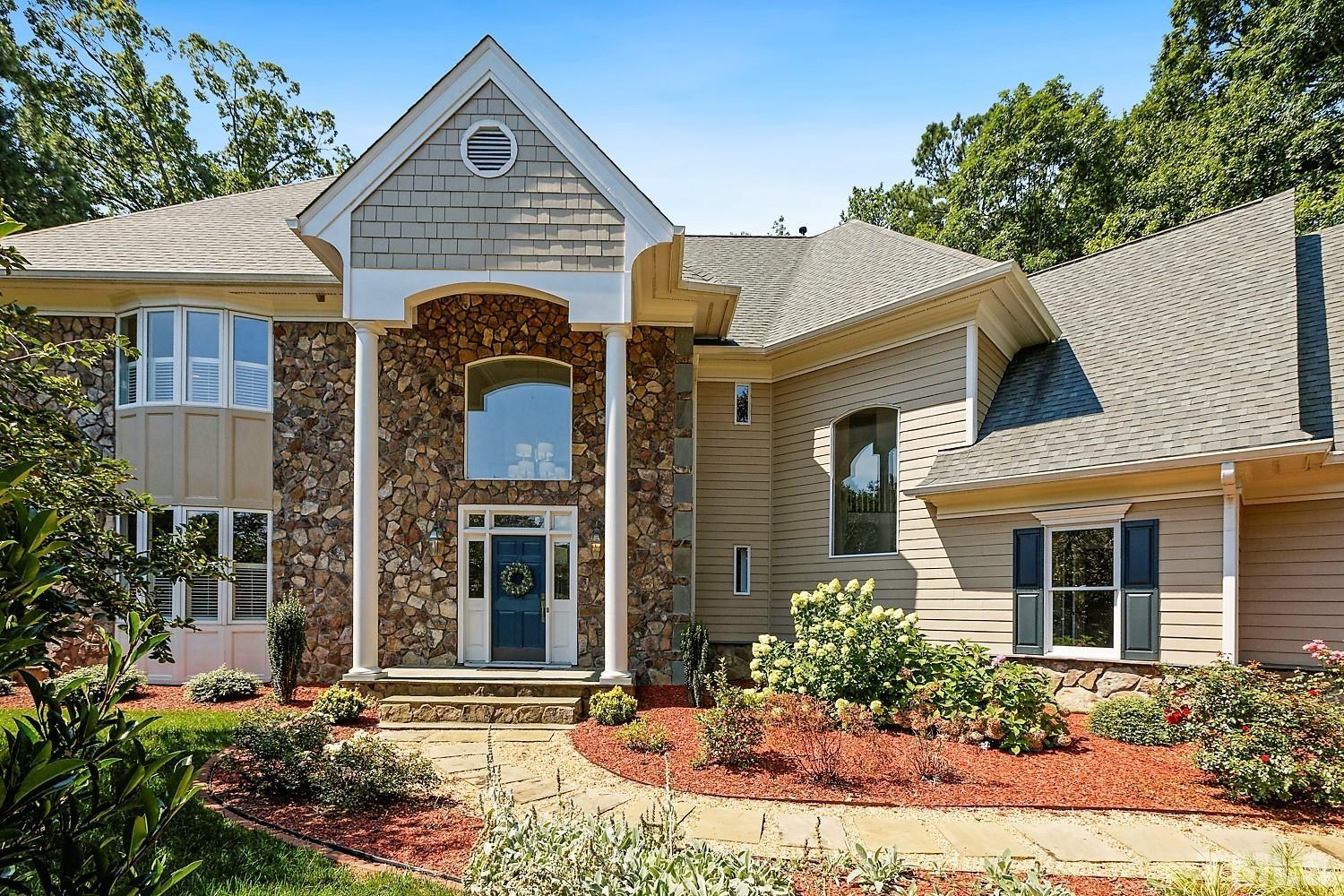 100 Greyfriars Lane Cary, NC 27518 - Photo 1 of 71 front view of a house