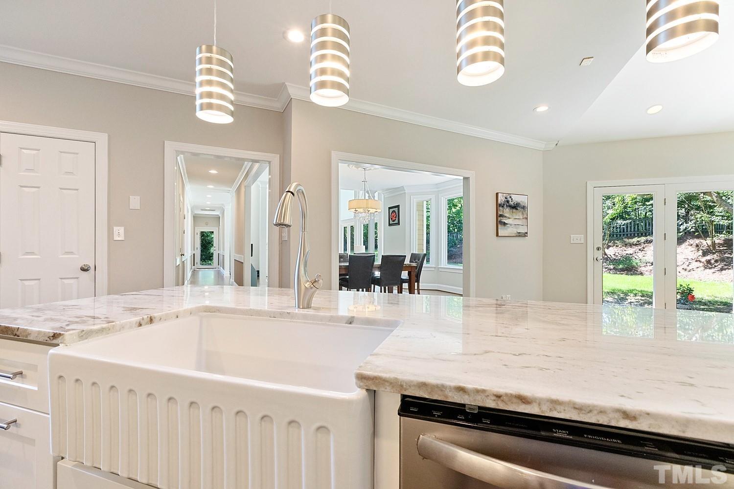 100 Greyfriars Lane Cary, NC 27518 - Photo 31 of 71 a bathroom with a granite countertop sink and a mirror