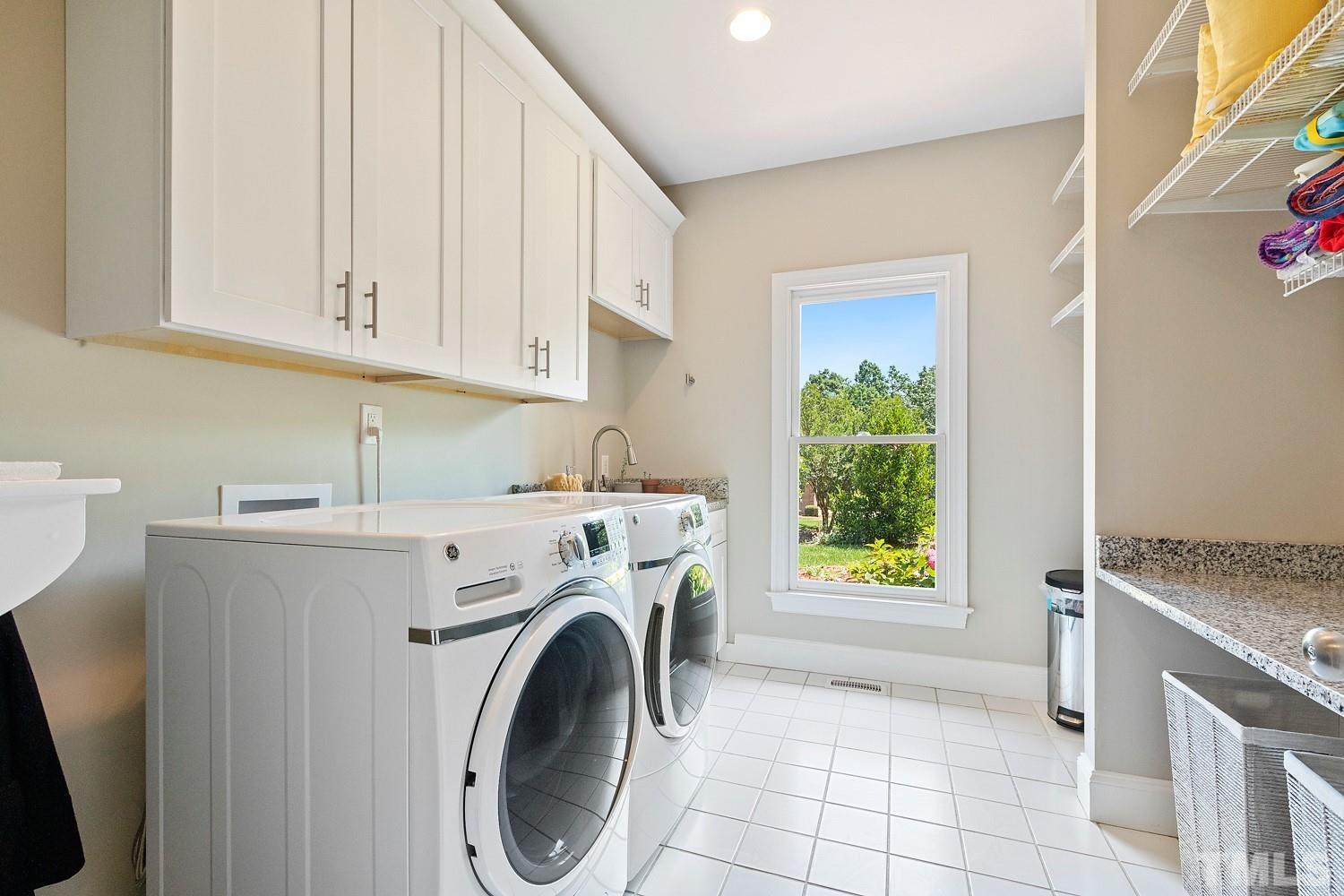 100 Greyfriars Lane Cary, NC 27518 - Photo 36 of 71 a utility room with dryer and washer