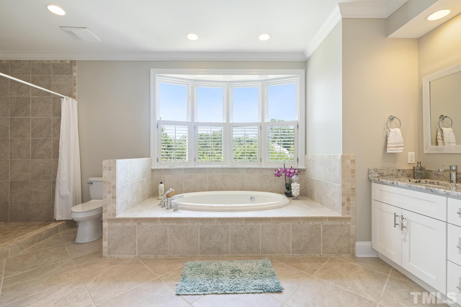 100 Greyfriars Lane Cary, NC 27518 - Photo 49 of 71 a living room with a couch and a table