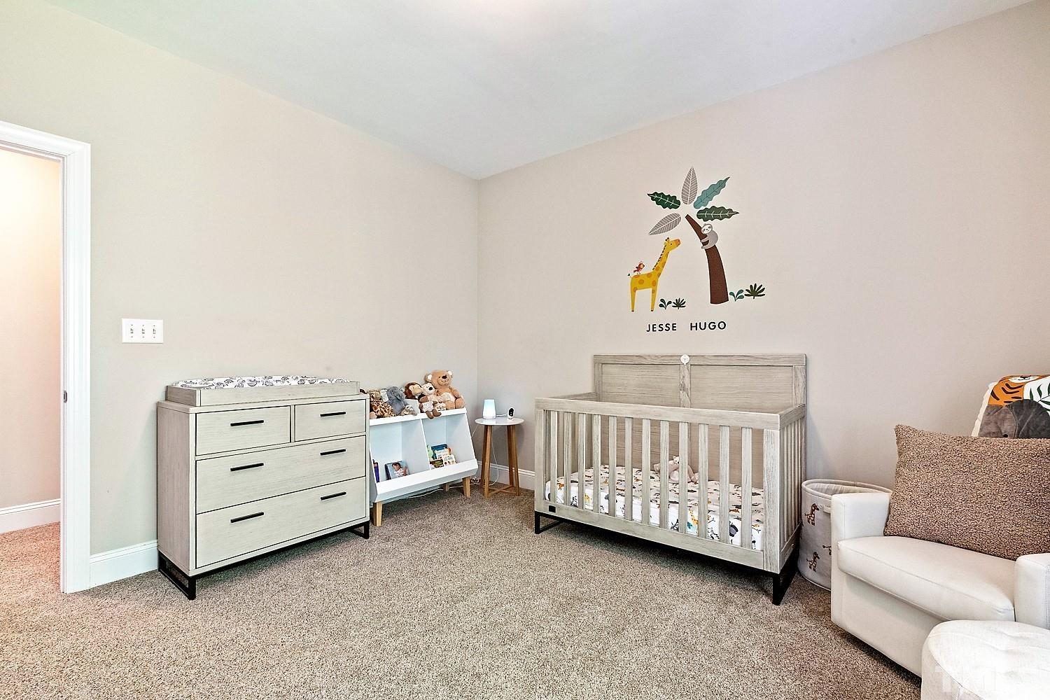 100 Greyfriars Lane Cary, NC 27518 - Photo 55 of 71 a view of a bedroom with baby crib and bedroom