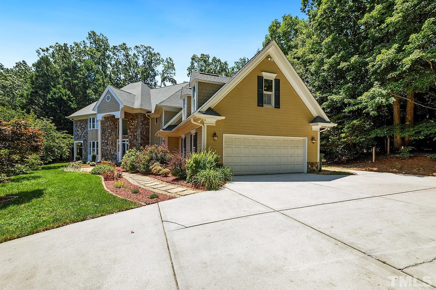 100 Greyfriars Lane Cary, NC 27518 - Photo 6 of 71 a front view of house with yard and green space