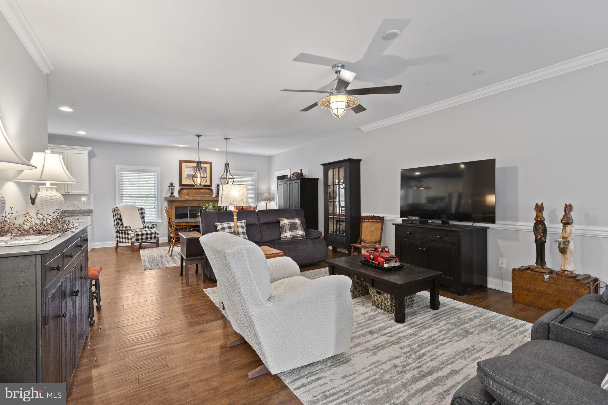 308 Rockspring Church Road Forest Hill, MD 21050 - Photo 16 of 79 a living room with furniture and a flat screen tv