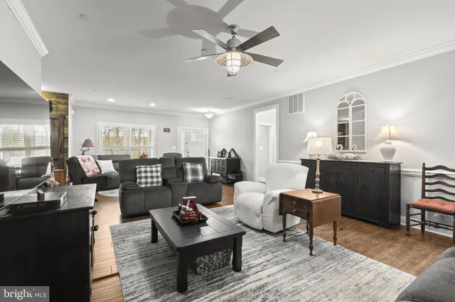 a kitchen with stainless steel appliances granite countertop a stove and a refrigerator