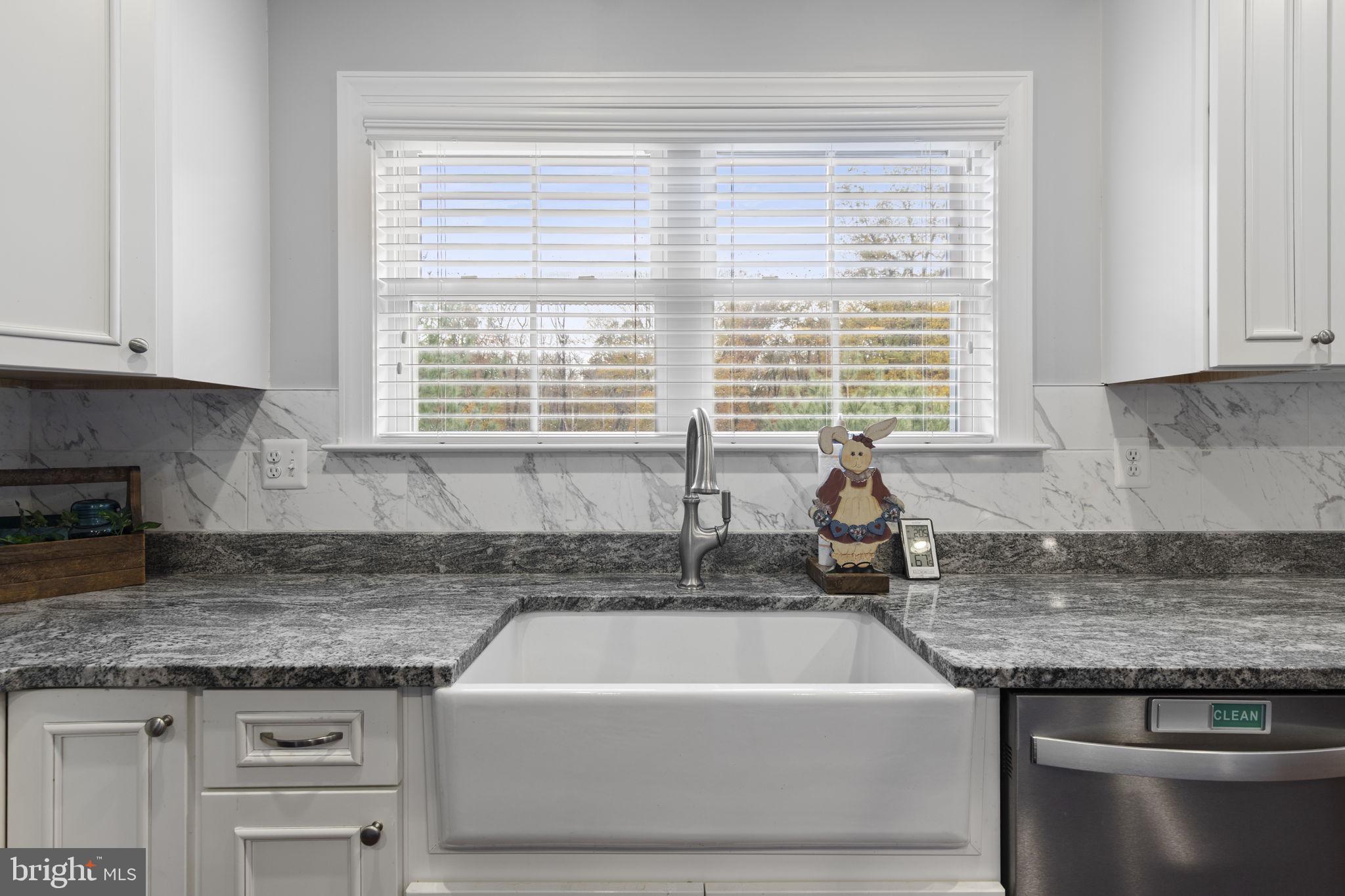 308 Rockspring Church Road Forest Hill, MD 21050 - Photo 26 of 79 a kitchen with granite countertop a sink and a window