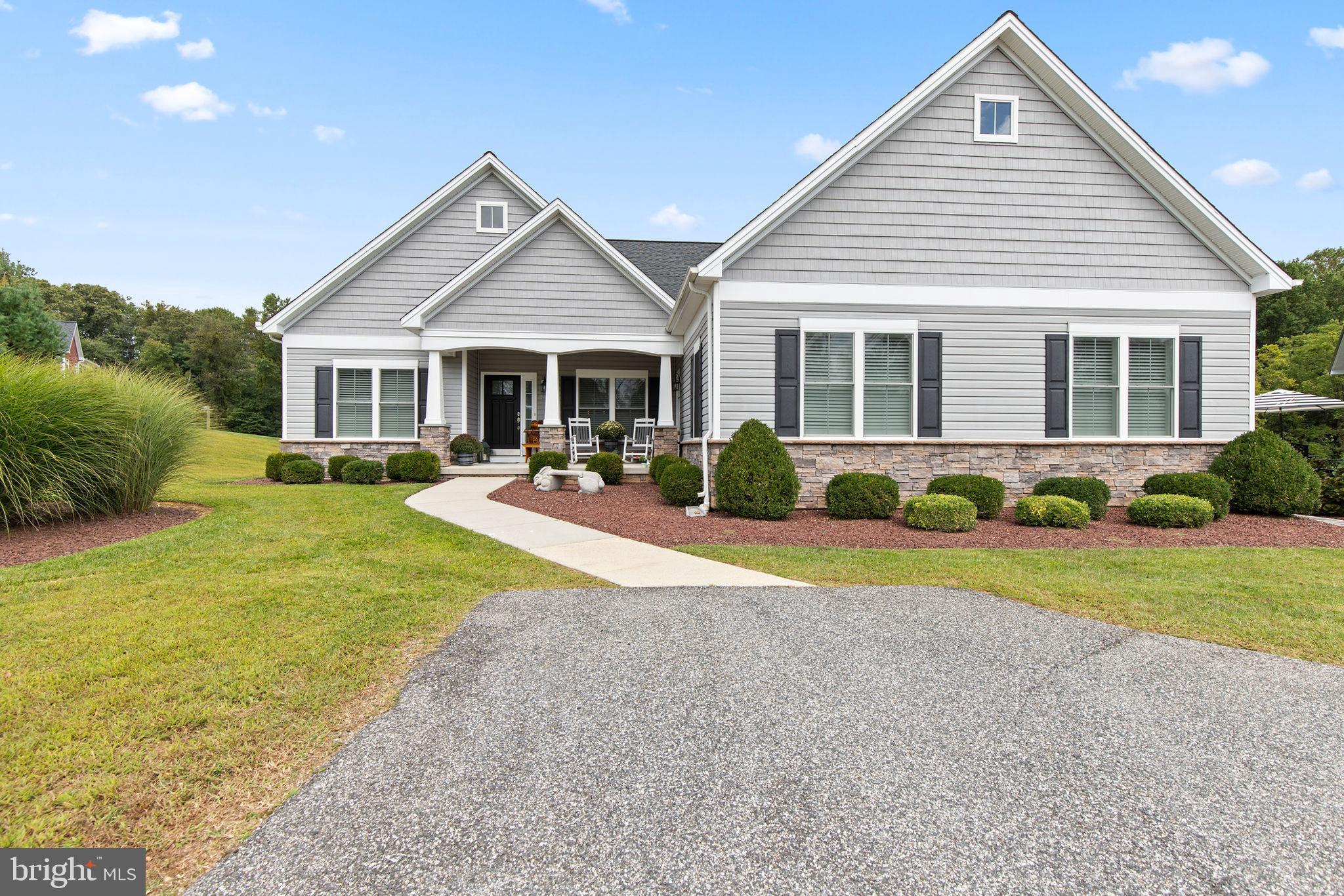 308 Rockspring Church Road Forest Hill, MD 21050 - Photo 3 of 79 a front view of a house with a yard and potted plants