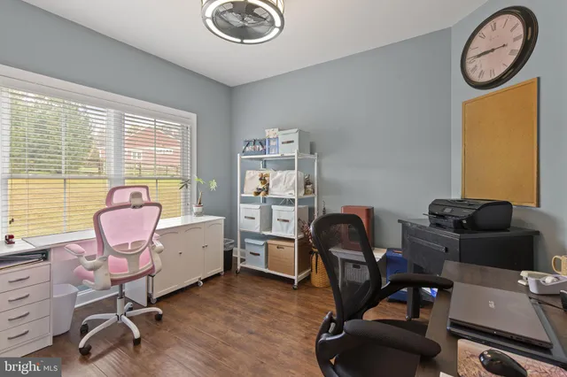 a kitchen with stainless steel appliances granite countertop a refrigerator stove and microwave