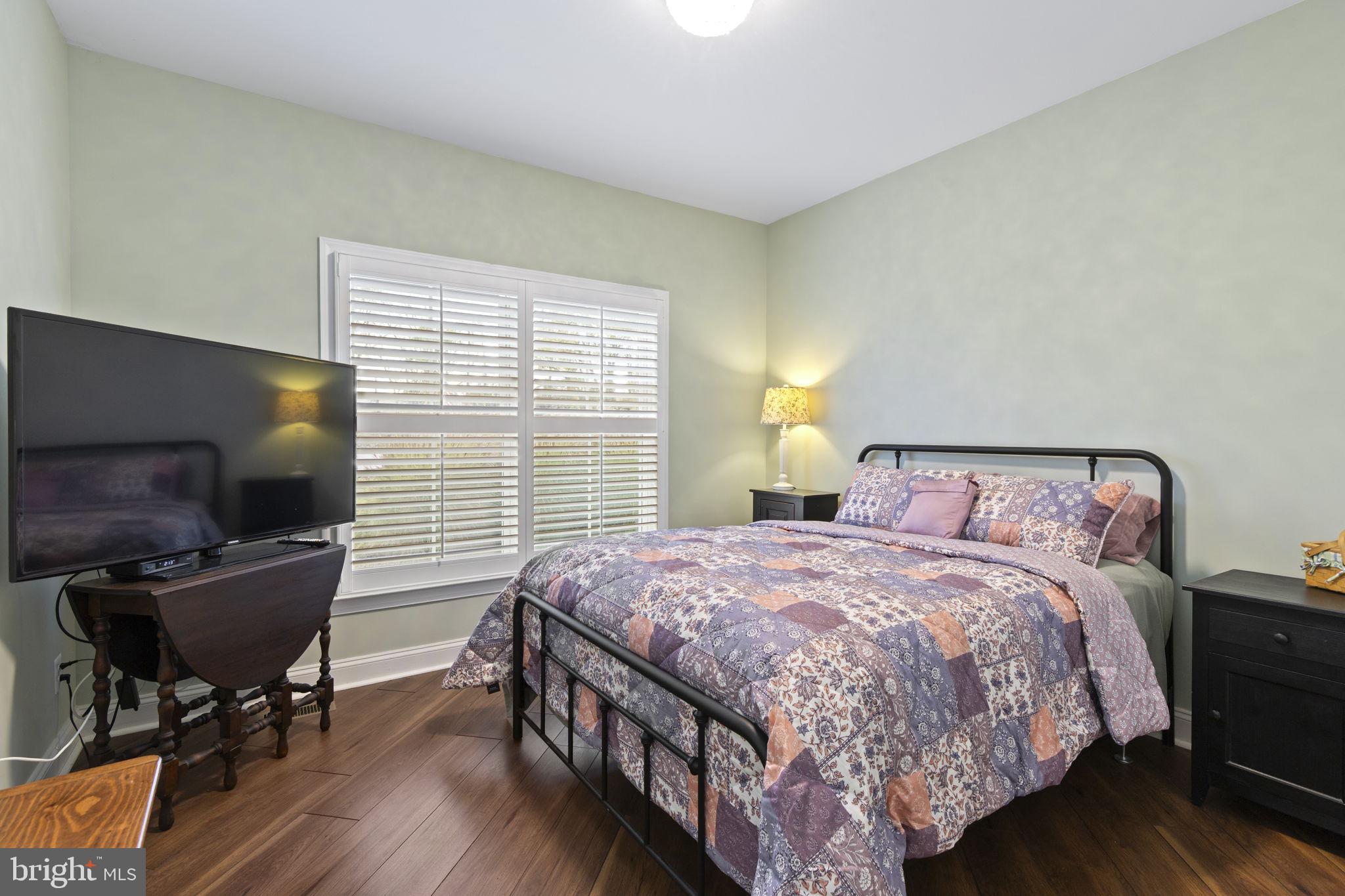 308 Rockspring Church Road Forest Hill, MD 21050 - Photo 35 of 79 a bedroom with a bed and a flat screen tv