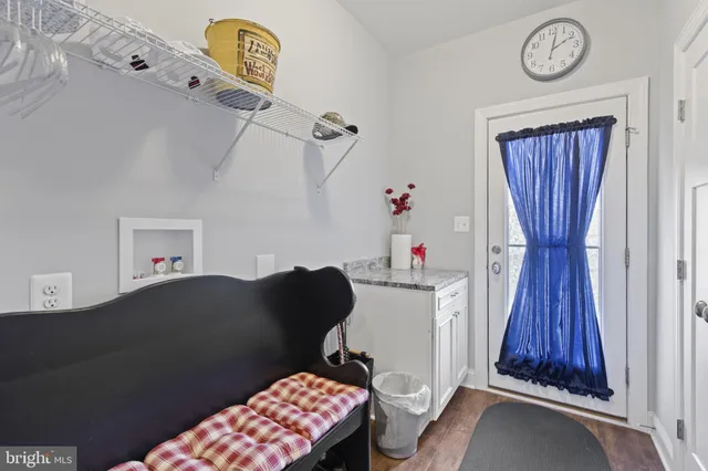 a bed room with a bed and a chair