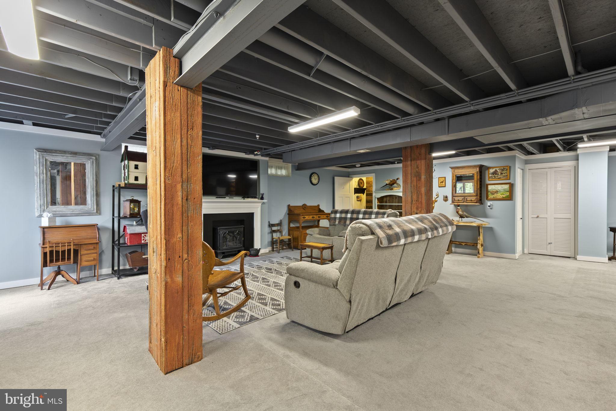 308 Rockspring Church Road Forest Hill, MD 21050 - Photo 53 of 79 a living room with furniture and a fireplace