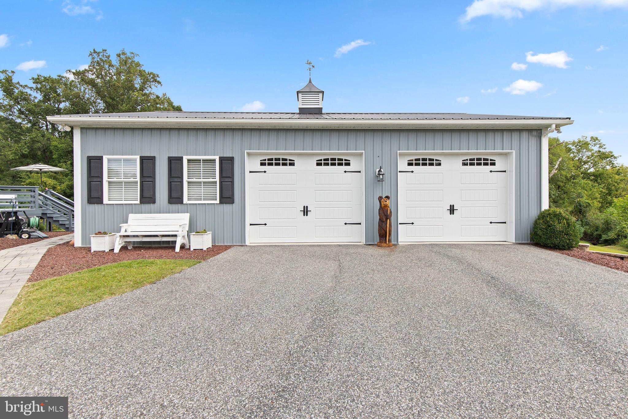 308 Rockspring Church Road Forest Hill, MD 21050 - Photo 65 of 79 a front view of a house with a yard and garage