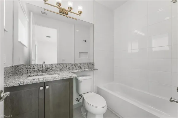 a small space with a white wall