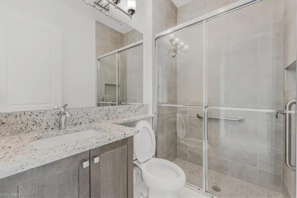 a kitchen with a sink and a stove