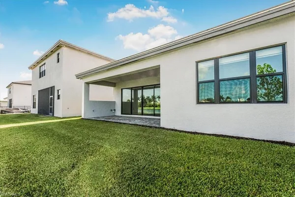 a view of a lake with a big yard