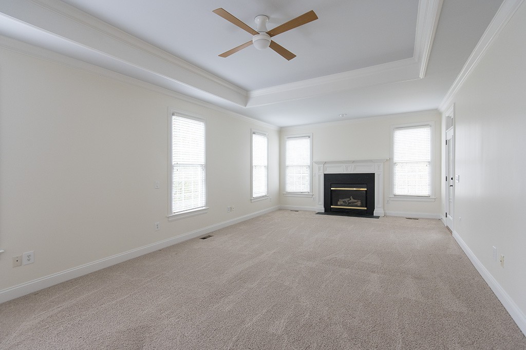 149 Allenhurst Circle Franklin, TN 37067 - Photo 12 of 44 an empty room with fireplace and windows