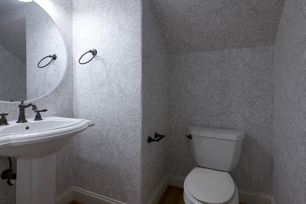 149 Allenhurst Circle Franklin, TN 37067 - Photo 27 of 44 a bathroom with a toilet sink and mirror