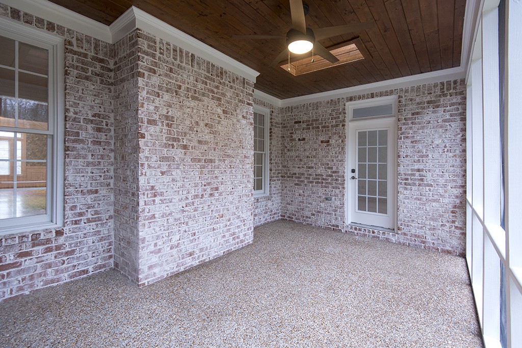 149 Allenhurst Circle Franklin, TN 37067 - Photo 32 of 44 a view of an empty room with brick wall and a window