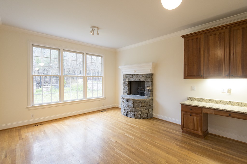 149 Allenhurst Circle Franklin, TN 37067 - Photo 10 of 44 a view of kitchen with granite countertop wooden floor a sink and a window