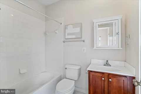 a outdoor space with patio the couches and a potted plant with the view of the balcony