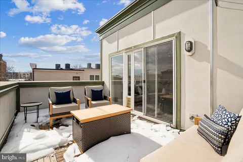 a front view of a building with lot of windows