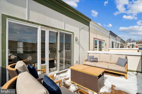 a view of a brick building with many windows