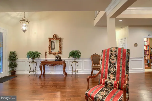 a view of an entryway and livingroom with furniture