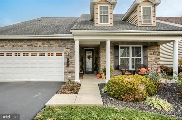 a workspace with furniture and a window
