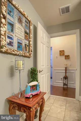 a front view of house with yard and outdoor seating