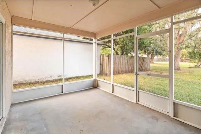 a view of an empty room and window