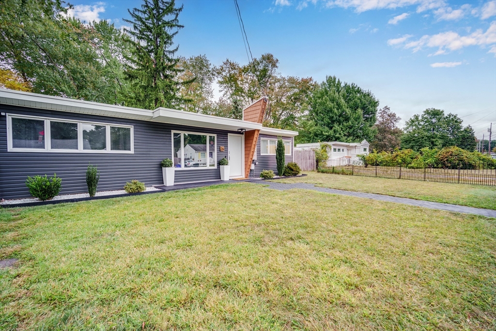 26 Groton Street Springfield, MA 01129 - Photo 20 of 24 a house view with swimming pool and garden space
