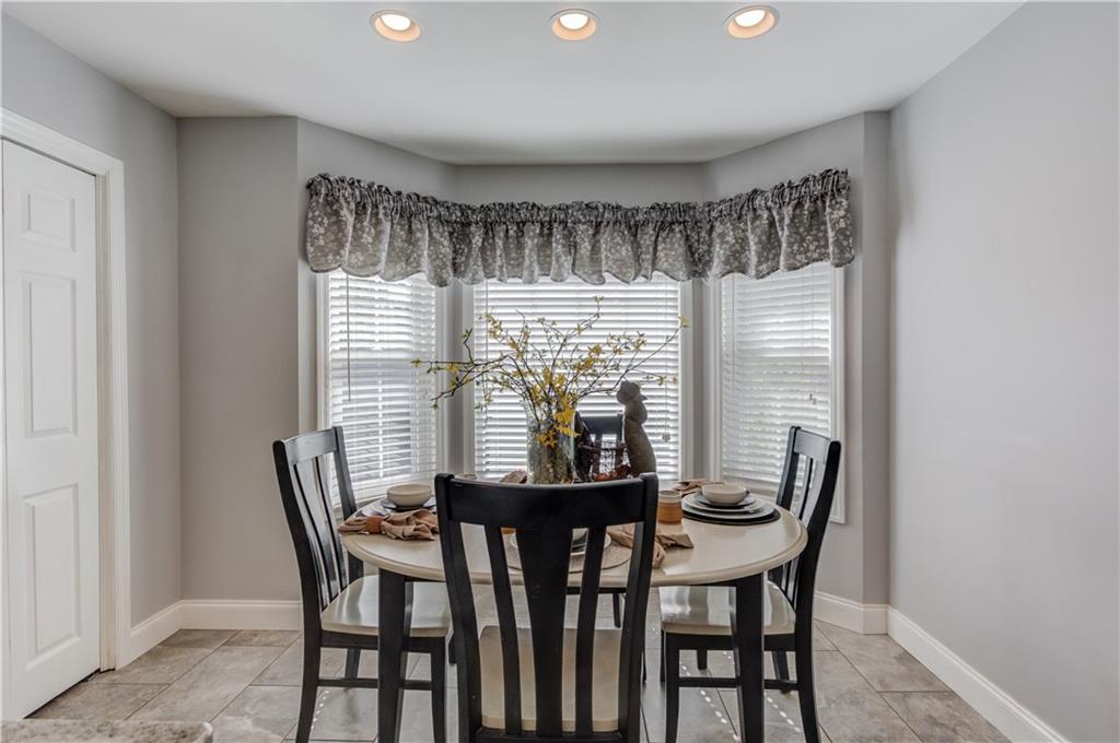 3220 Governors Court Duluth, GA 30096 - Photo 15 of 48 a view of a dining room with furniture and window