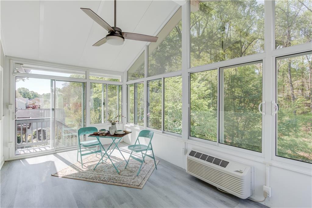 3220 Governors Court Duluth, GA 30096 - Photo 17 of 48 a living room with furniture and a large window
