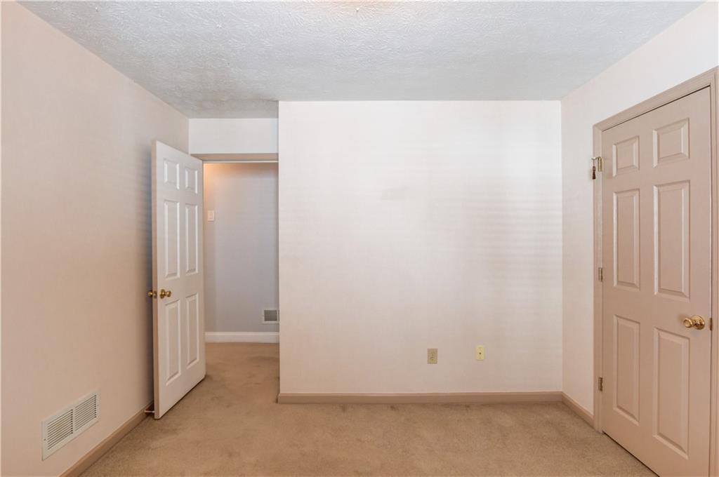 3220 Governors Court Duluth, GA 30096 - Photo 29 of 48 an empty room with windows