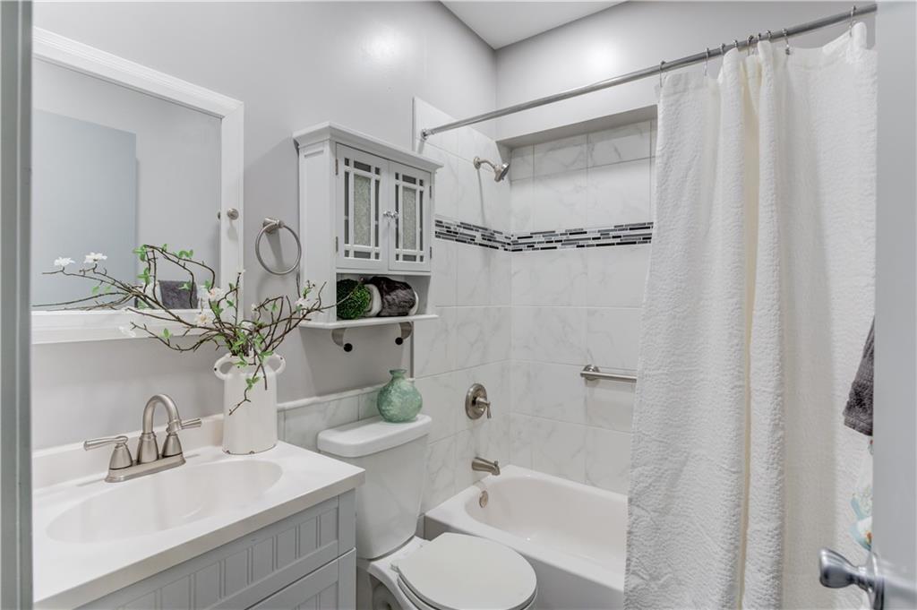 3220 Governors Court Duluth, GA 30096 - Photo 35 of 48 a bathroom with a sink toilet and shower