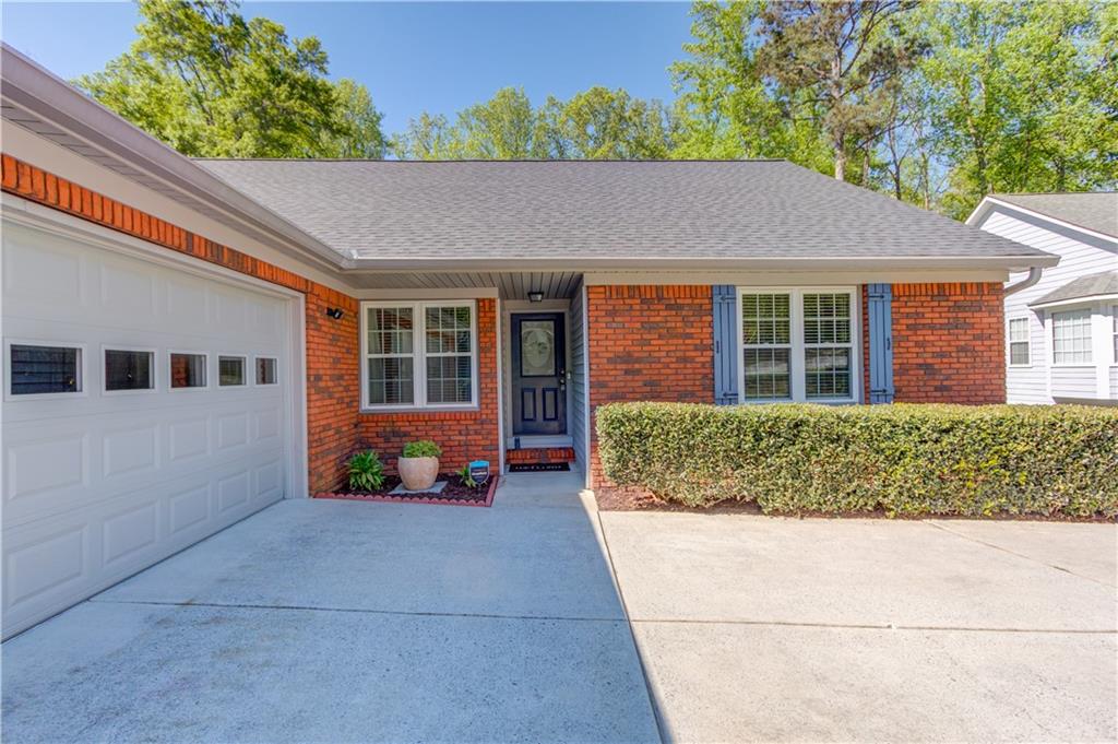 3220 Governors Court Duluth, GA 30096 - Photo 4 of 48 front view of a house with a yard