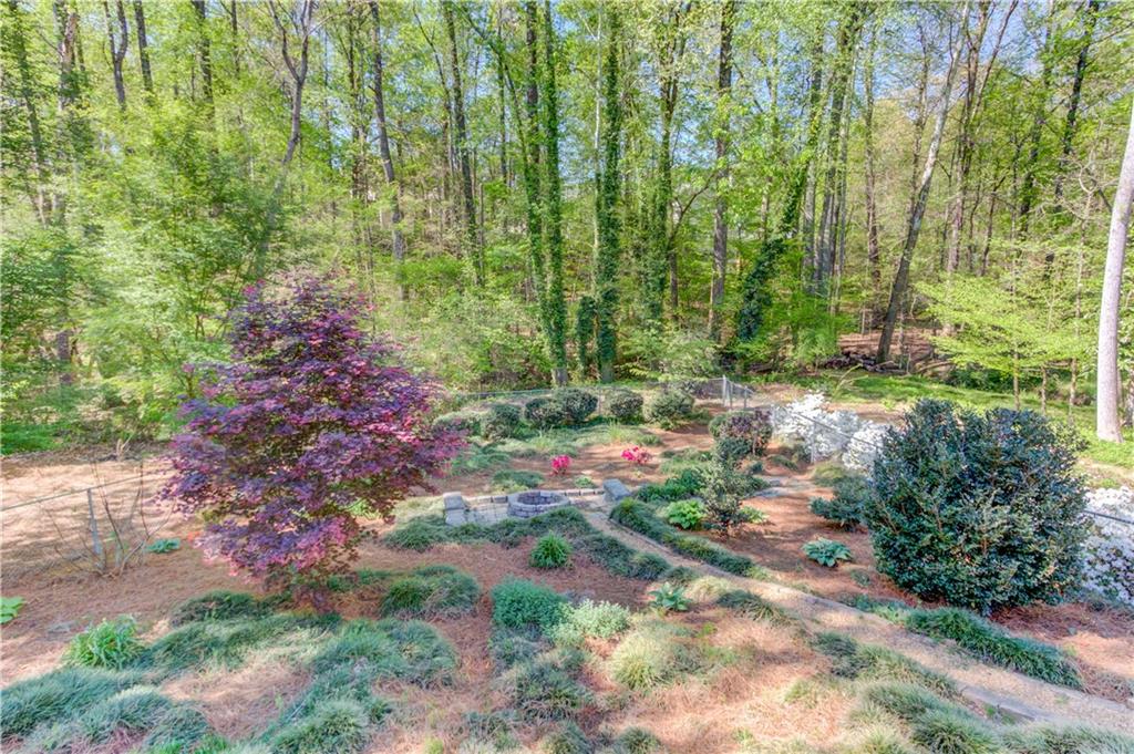 3220 Governors Court Duluth, GA 30096 - Photo 43 of 48 a backyard of a house with lots of green space