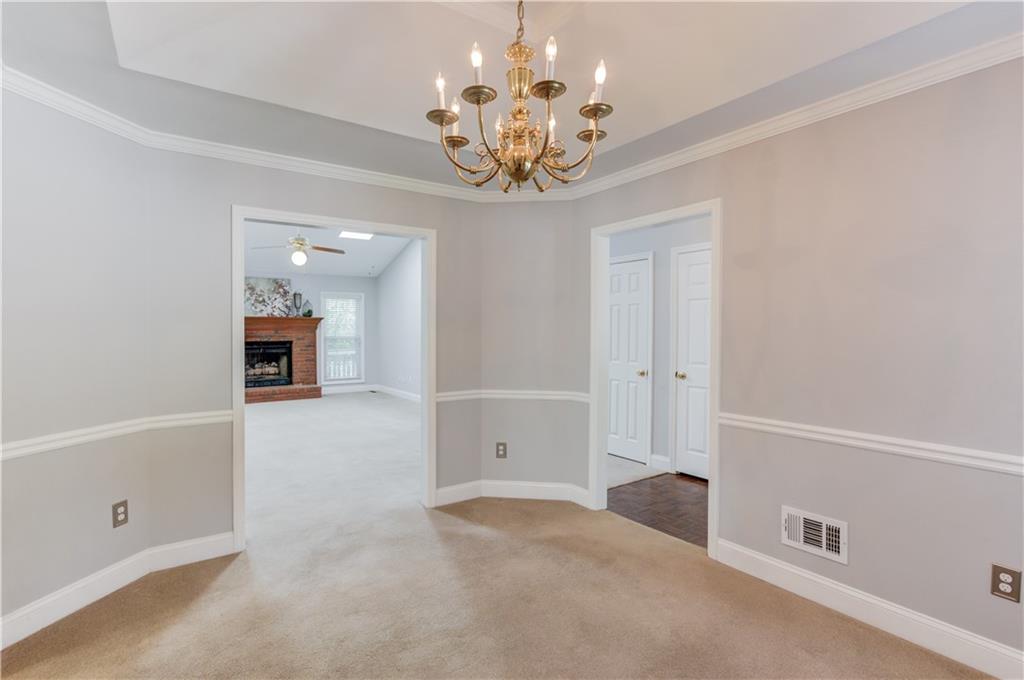 3220 Governors Court Duluth, GA 30096 - Photo 9 of 48 a view of an empty room with a window