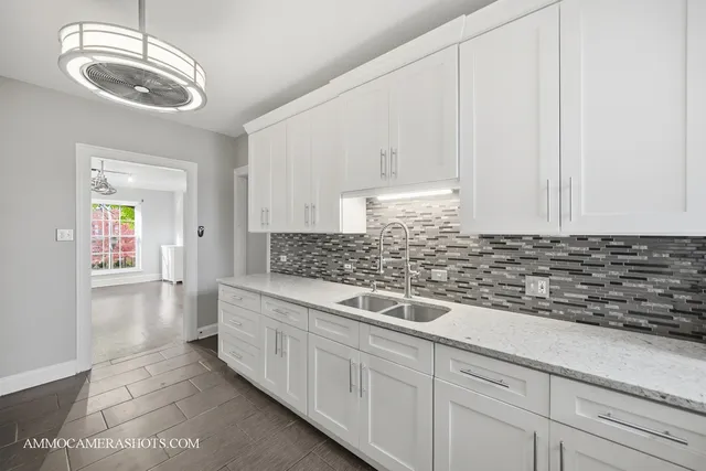 $230,000 | 6807 South Paxton Avenue, Unit 1, Chicago, IL 60649