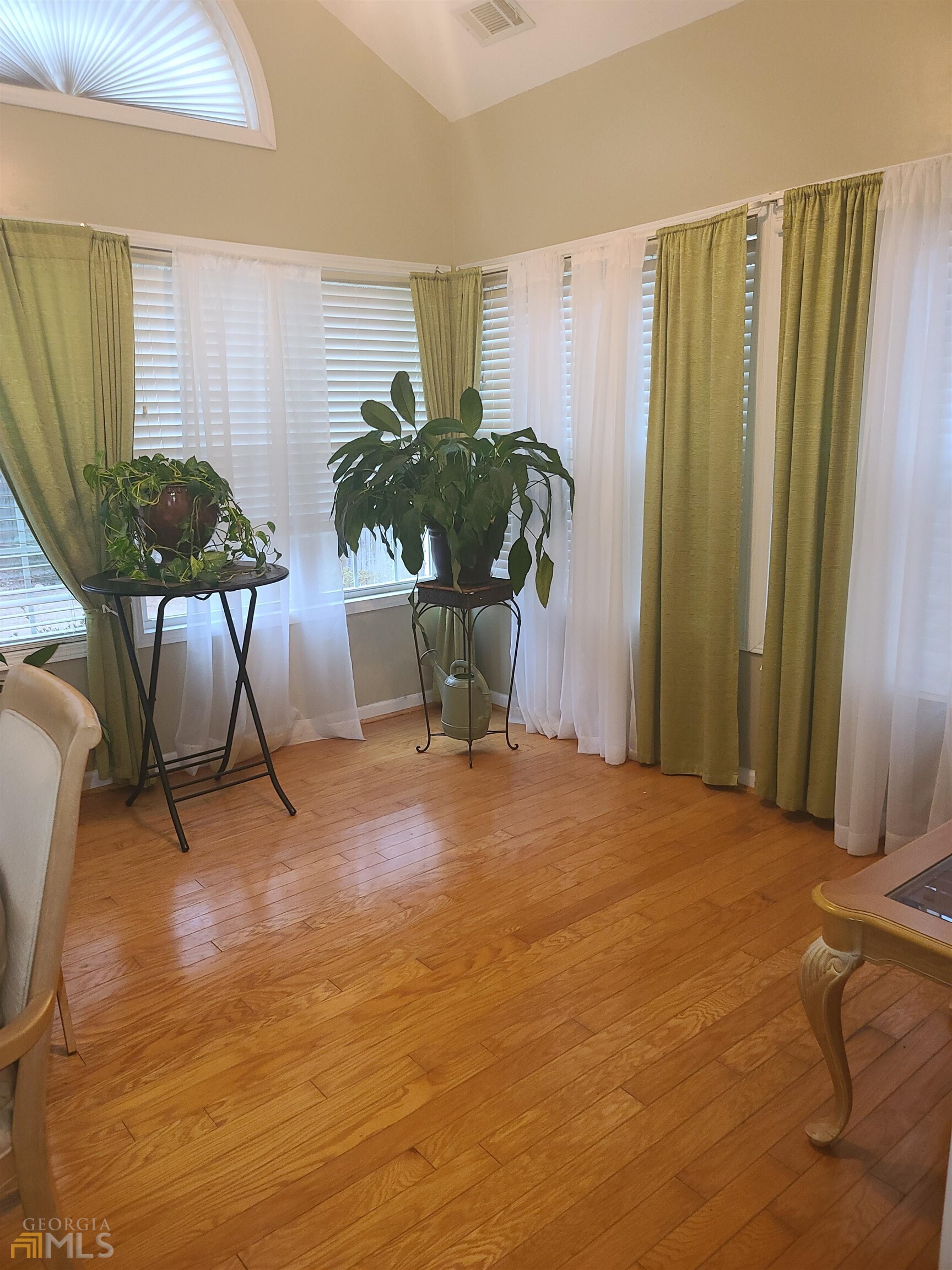 4857 Shae Court Powder Springs, GA 30127 - Photo 7 of 21 a living room with furniture and a potted plant