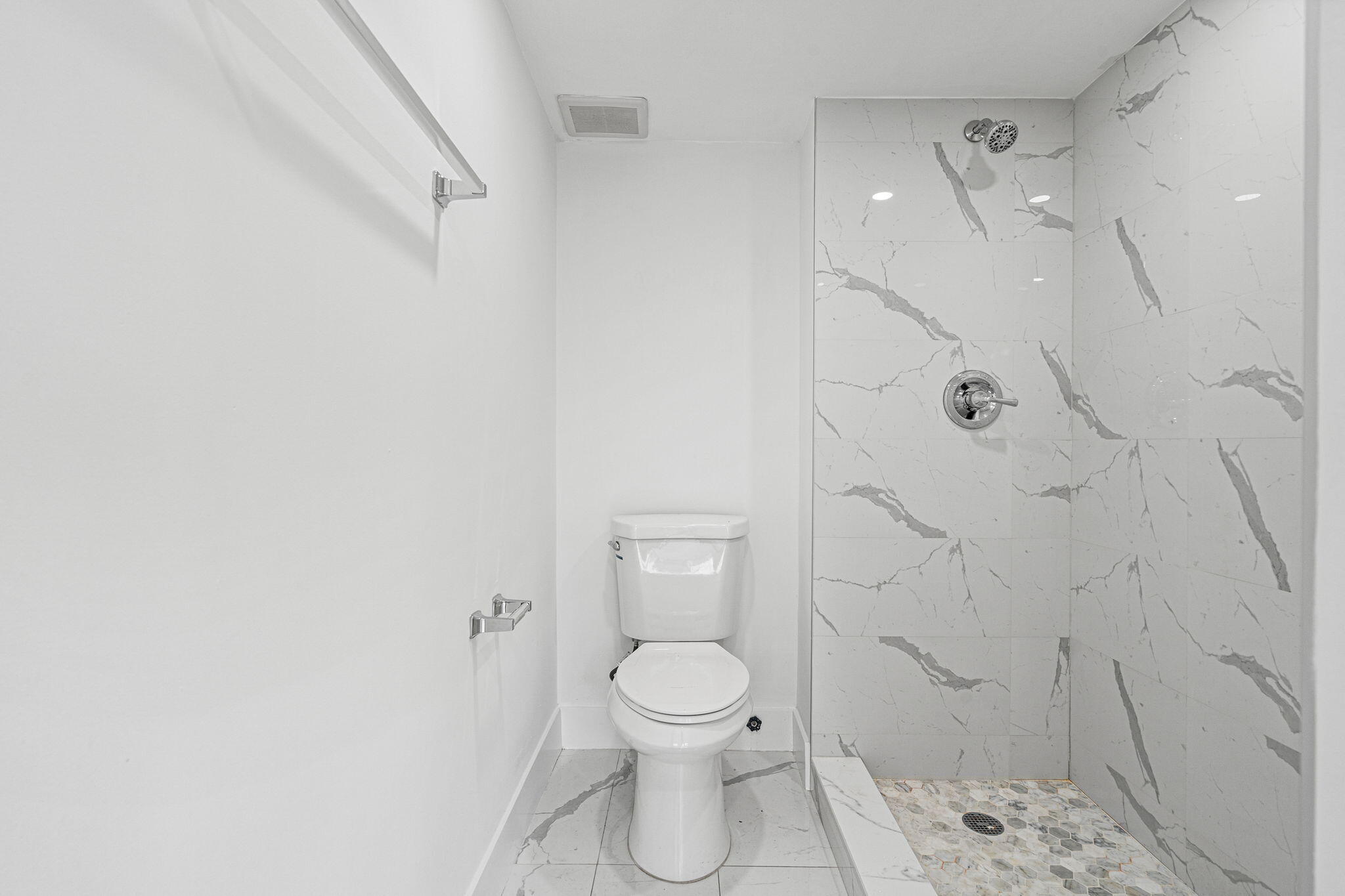 9227 Southwest 87th Avenue, Unit B1 Miami, FL 33176 - Photo 15 of 27 a bathroom with a toilet and a shower