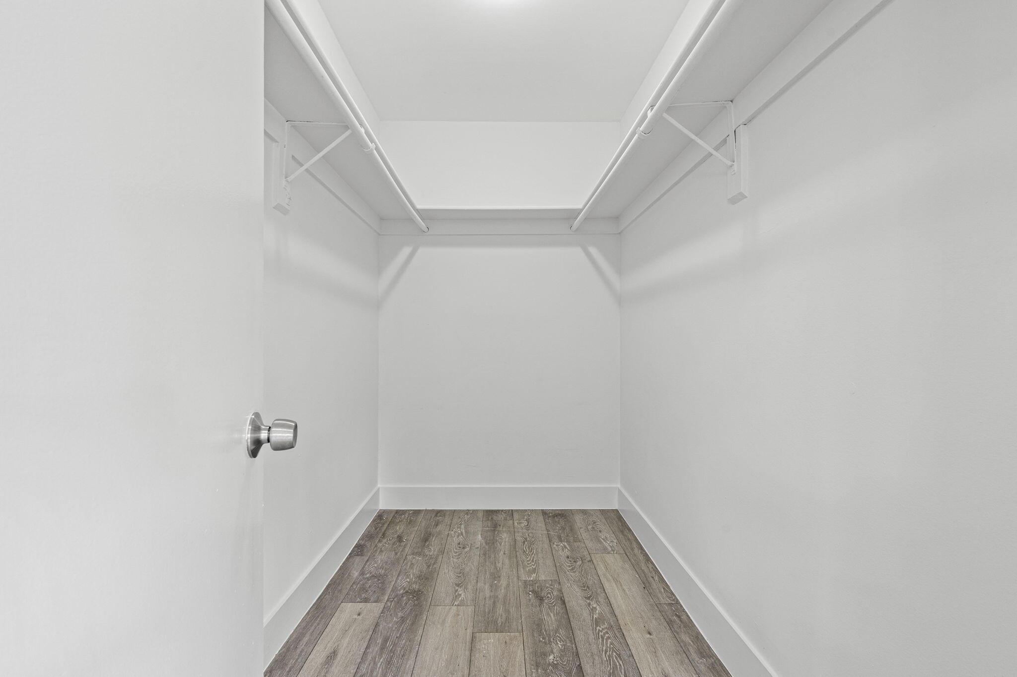 9227 Southwest 87th Avenue, Unit B1 Miami, FL 33176 - Photo 16 of 27 a view of an empty walk in closet