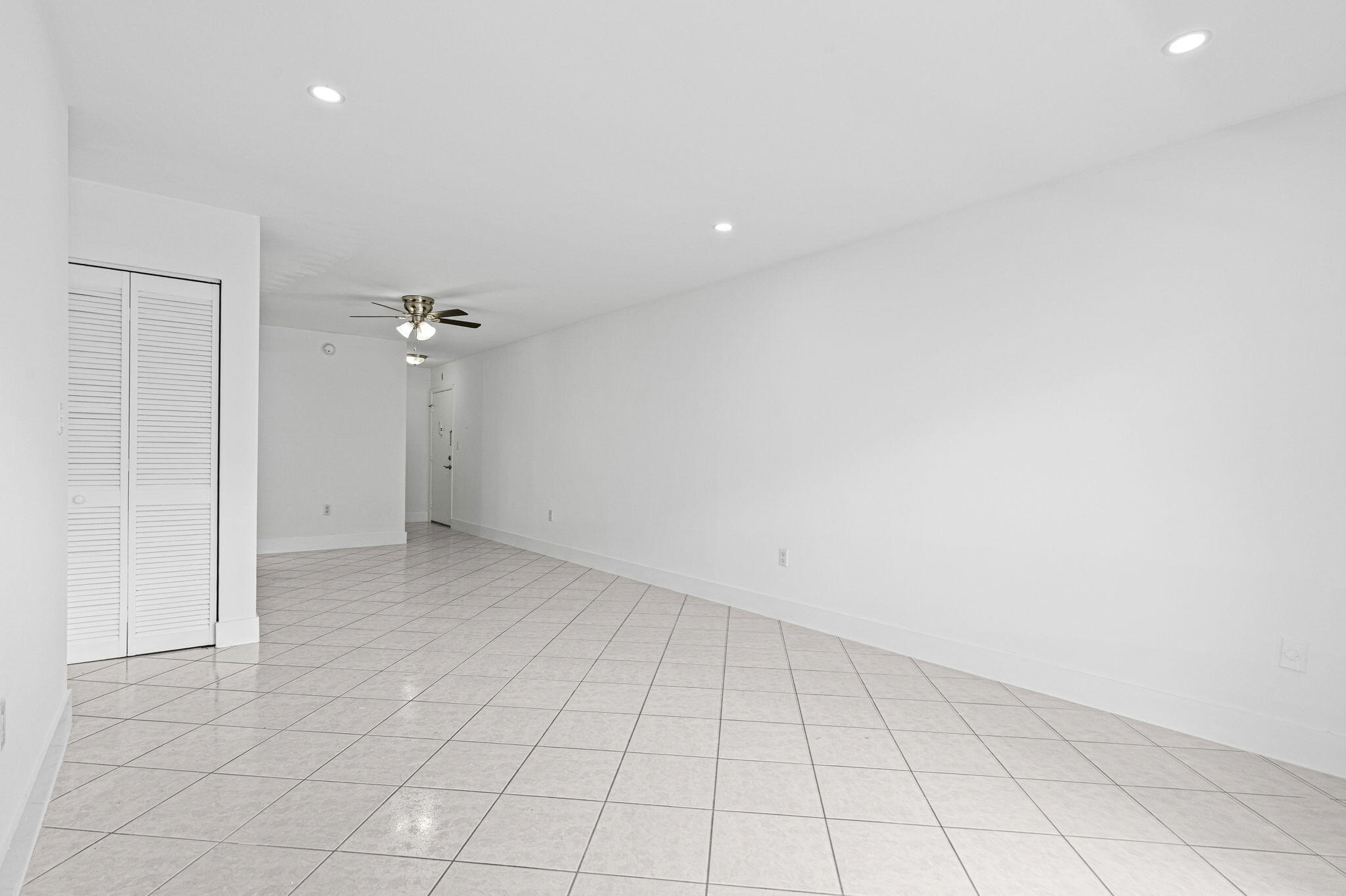 9227 Southwest 87th Avenue, Unit B1 Miami, FL 33176 - Photo 18 of 27 wooden floor in an empty room
