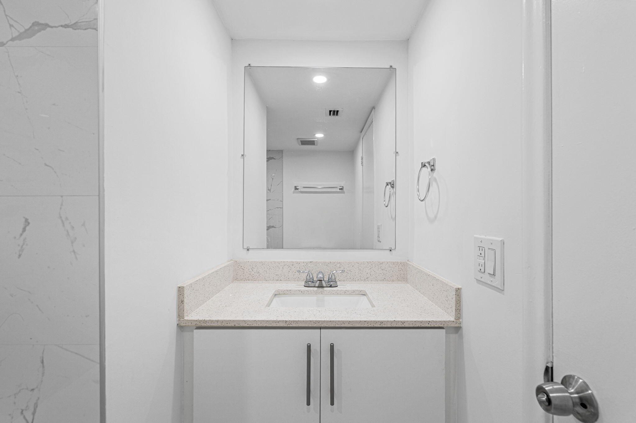 9227 Southwest 87th Avenue, Unit B1 Miami, FL 33176 - Photo 21 of 27 a bathroom with a sink and a mirror