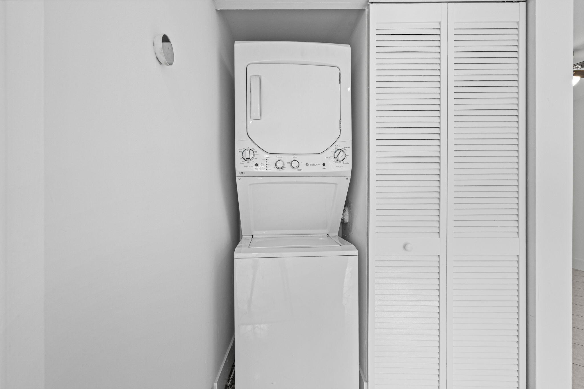 9227 Southwest 87th Avenue, Unit B1 Miami, FL 33176 - Photo 23 of 27 a utility room with dryer and washer